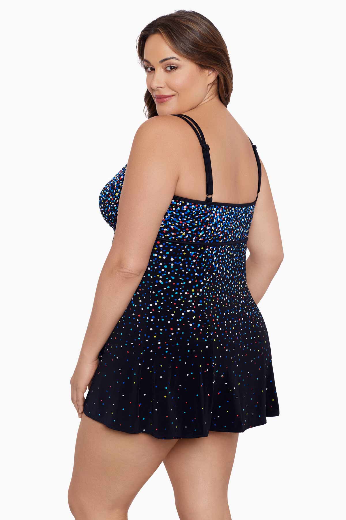Woman turned left wearing a multicolored speckled pattern black swim dress