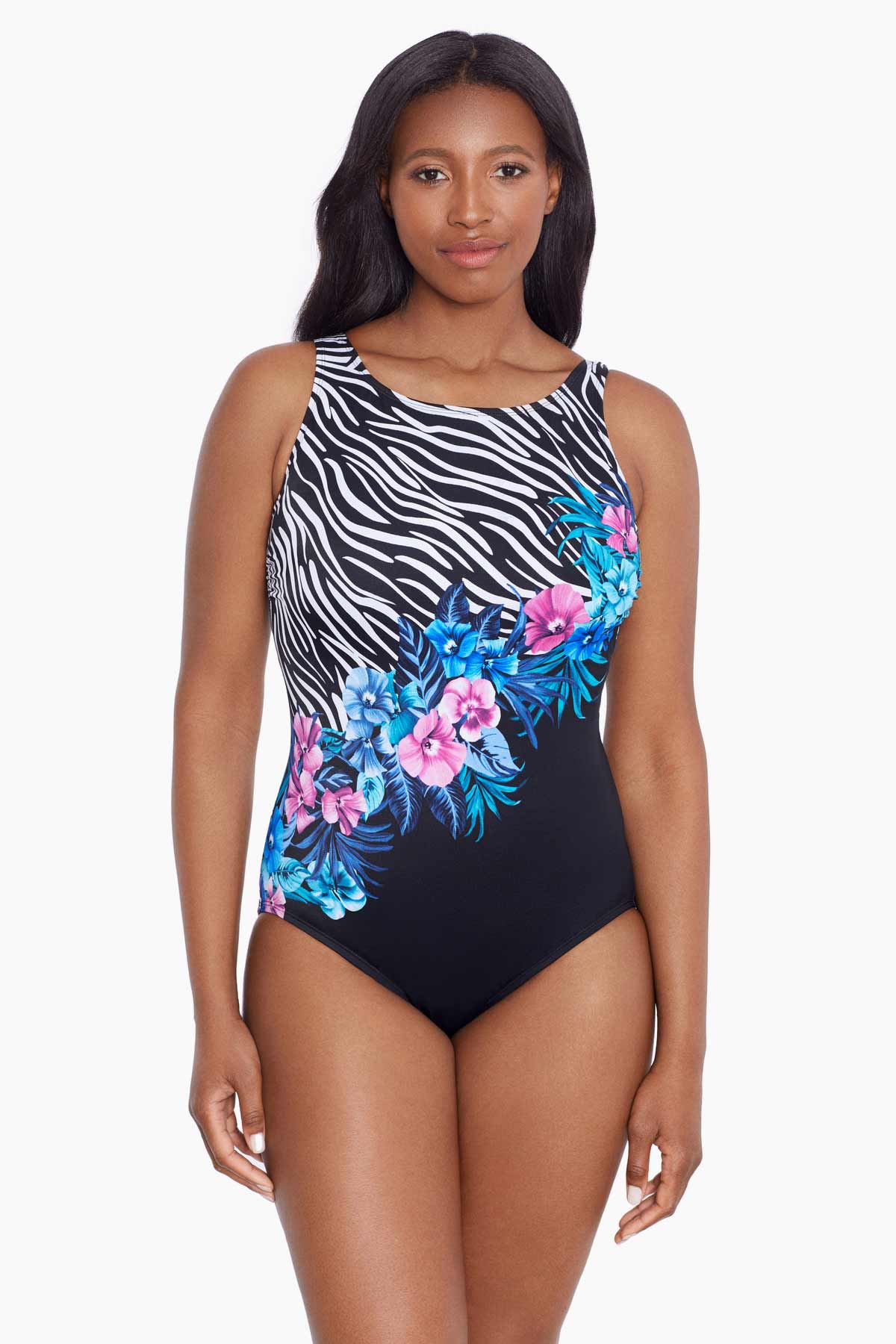 Woman wearing a half zebra print with blue and pink florals down the middle one-piece swimsuit