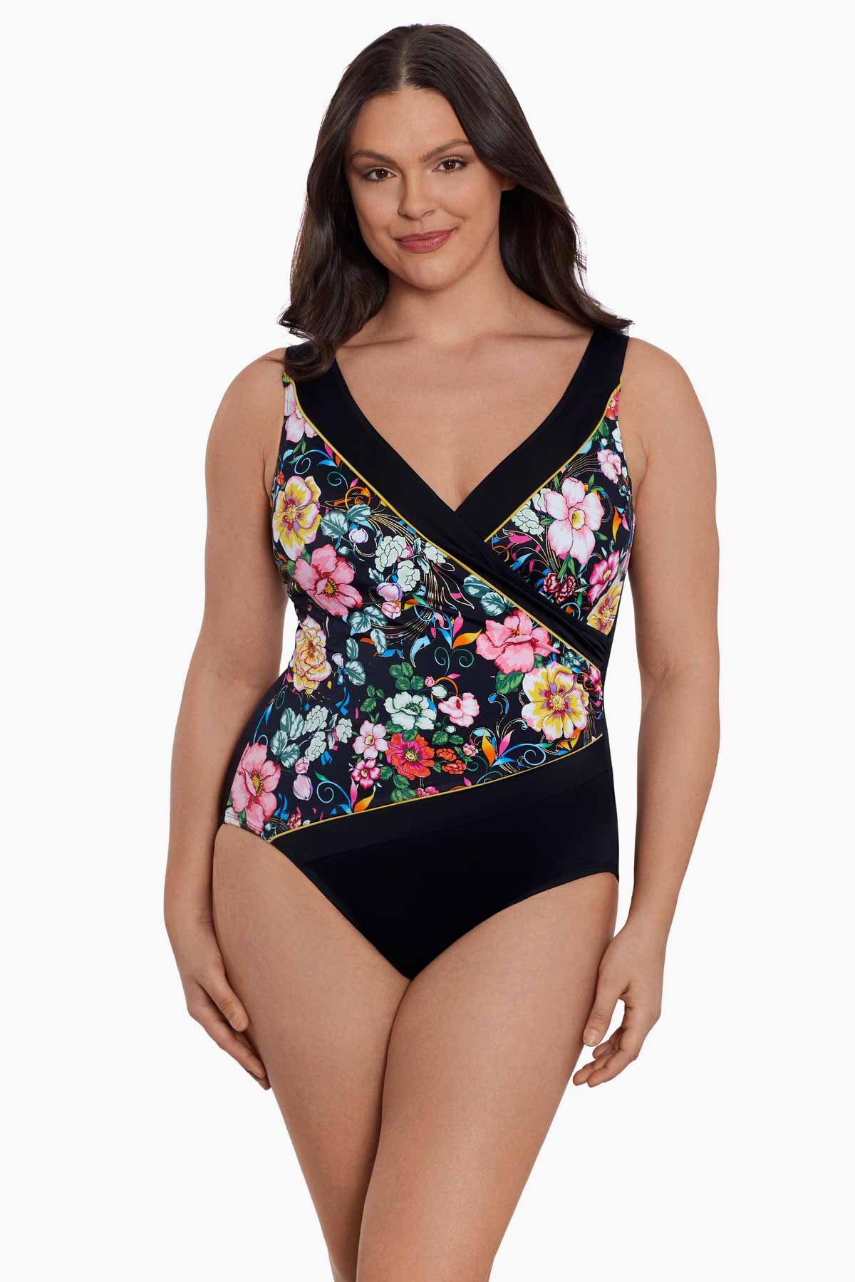 Woman wearing a floral printed one-piece swimsuit