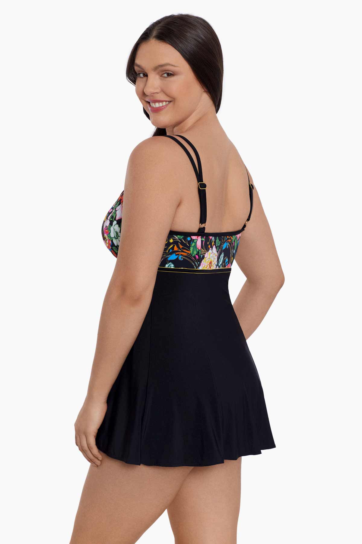 Woman turned left wearing a floral print at the bust swim dress