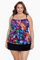 Woman wearing a rainbow ribbon printed ruffle skirtini swimsuit