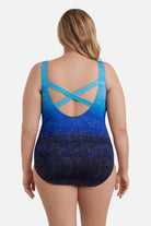 Woman faced away wearing a blue ombre one-piece swimsuit with shimmer detail