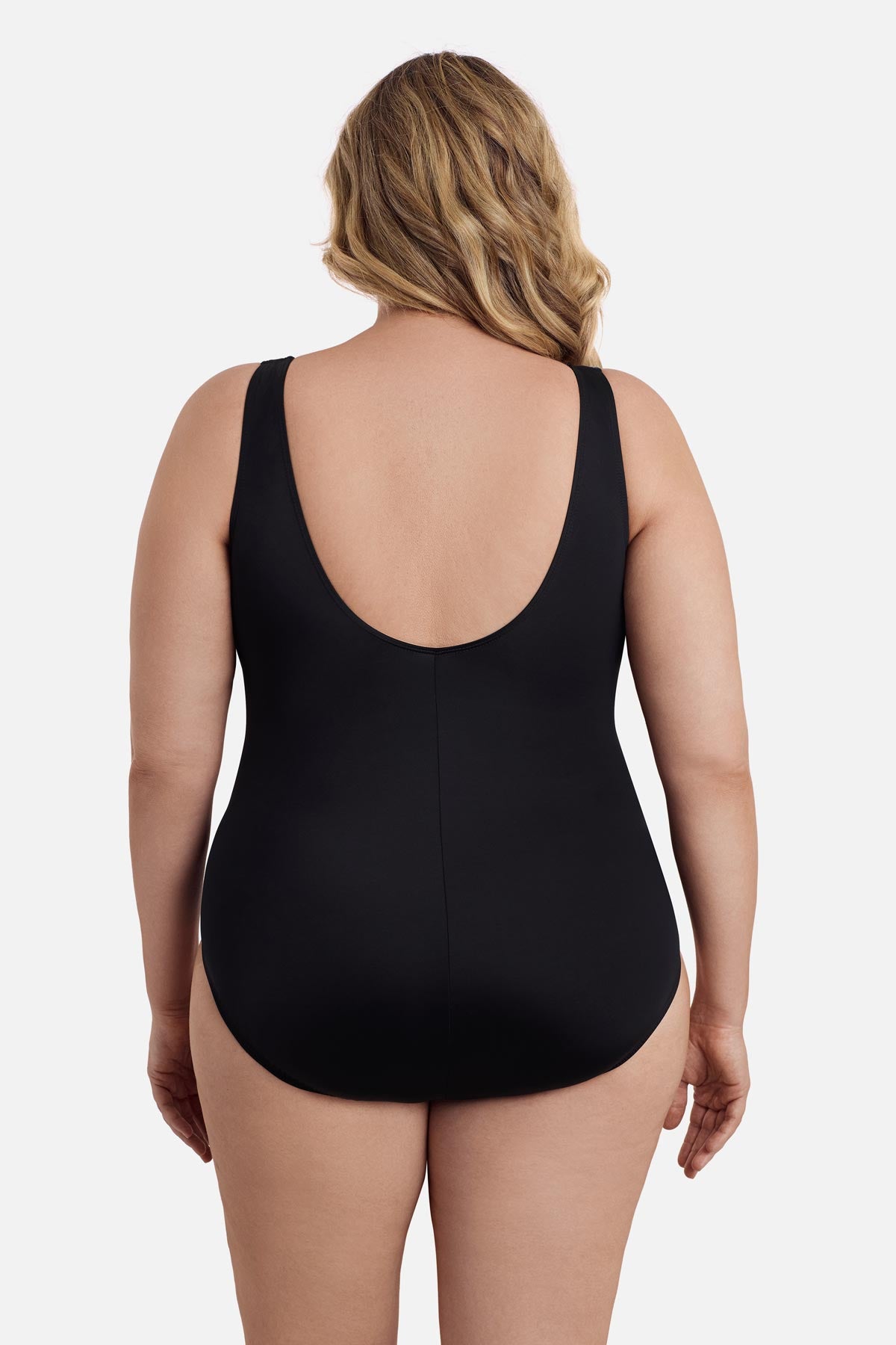Woman turned away wearing a one-piece swimsuit 