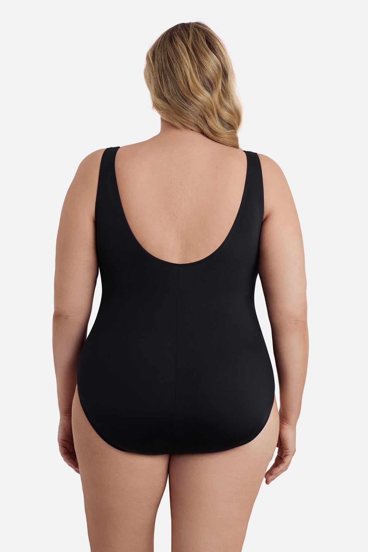 Woman turned away wearing a one-piece swimsuit 