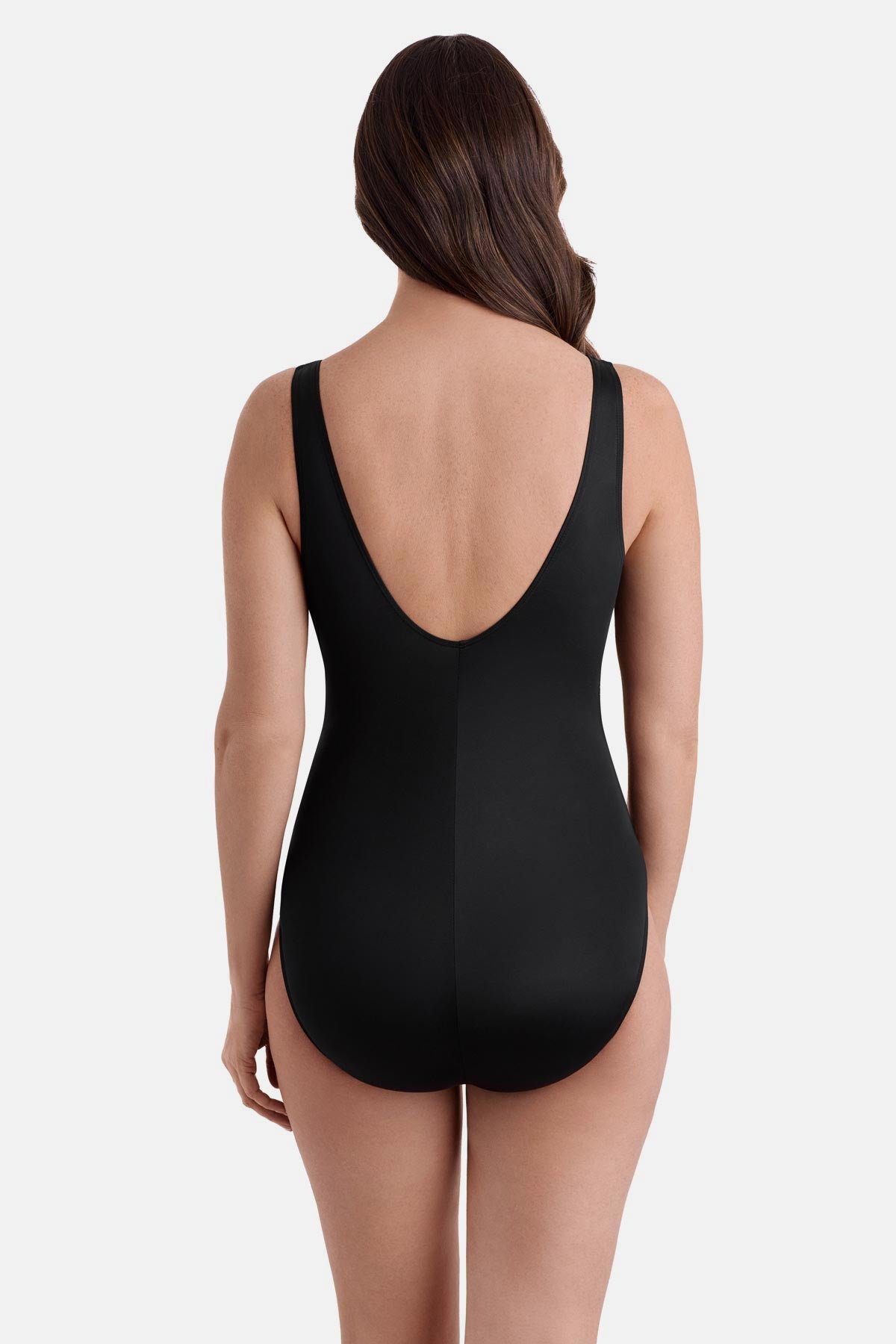 Woman turned away wearing a one piece with a scoop back