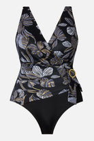 White and gold floral pattern one piece with a v-neck