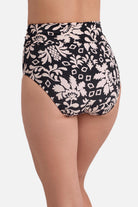 Back view of black and white palm tree printed high waisted swim bottoms