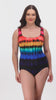 Woman wearing a rainbow tie dye one-piece swimsuit