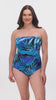 Woman wearing a blue palm leaf printed bandeau one-piece swimsuit