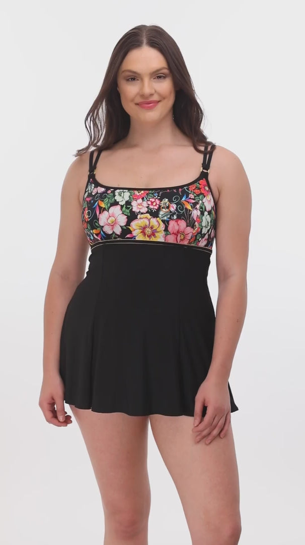 Woman wearing a floral print at the bust swim dress