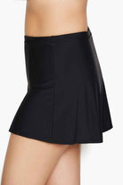 Side of black swim skirt with side slit