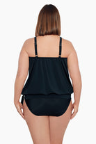 Woman faced away wearing a black high neck blouson tankini top