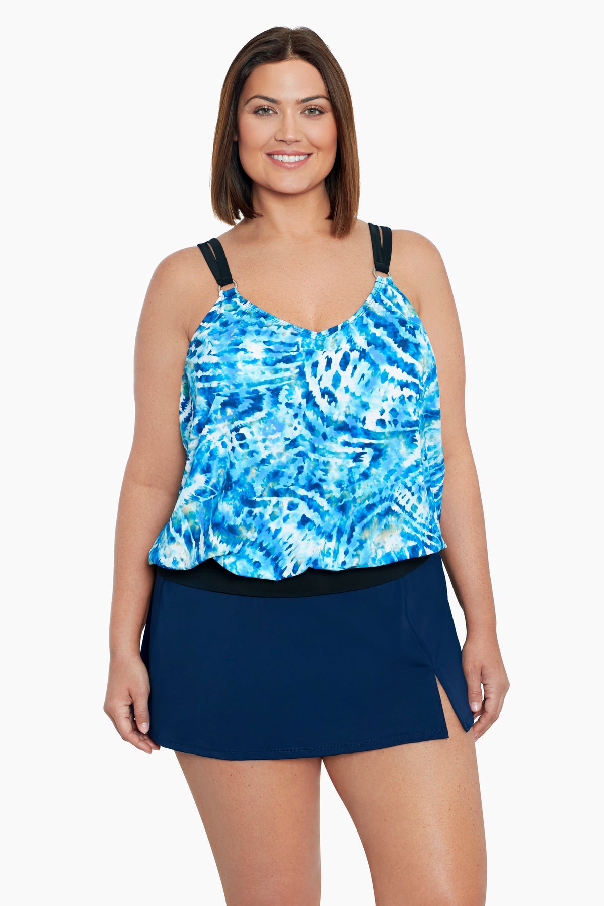 Woman wearing a blue and white tie dye blouson tankini top