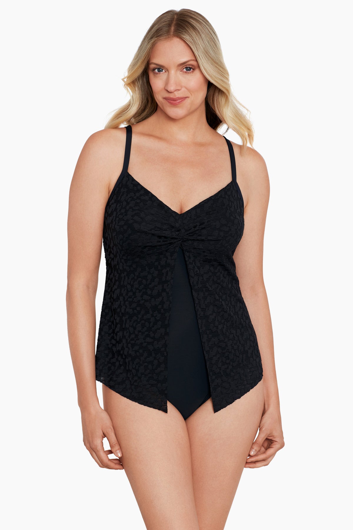 Woman wearing a black with light animal print cut away fauxkini one-piece swimsuit