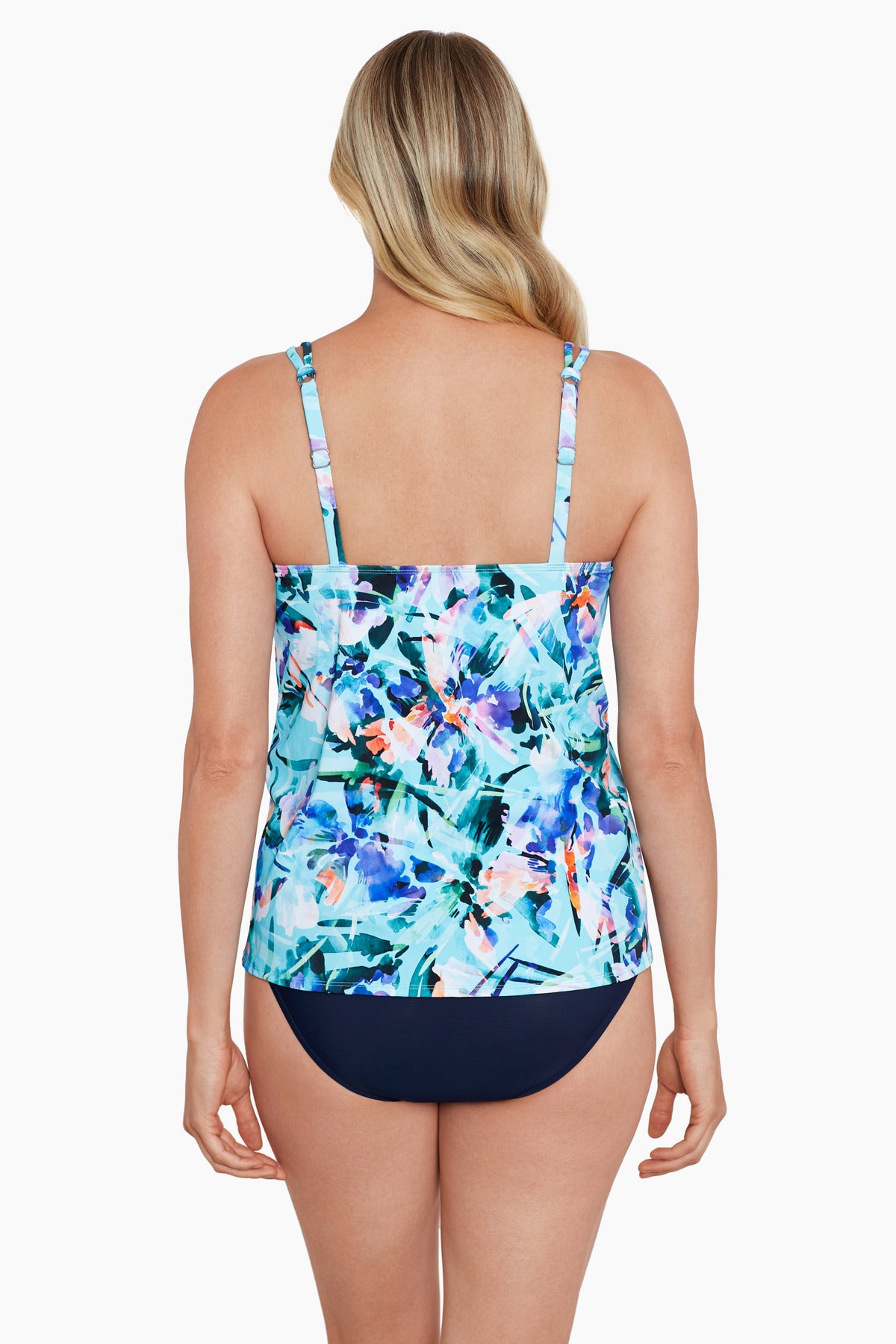 Woman turned away wearing a multicolored floral printed handkerchief tankini top