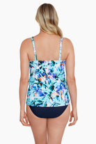 Woman turned away wearing a multicolored floral printed handkerchief tankini top