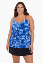 Woman wearing a blue tie dye tankini top