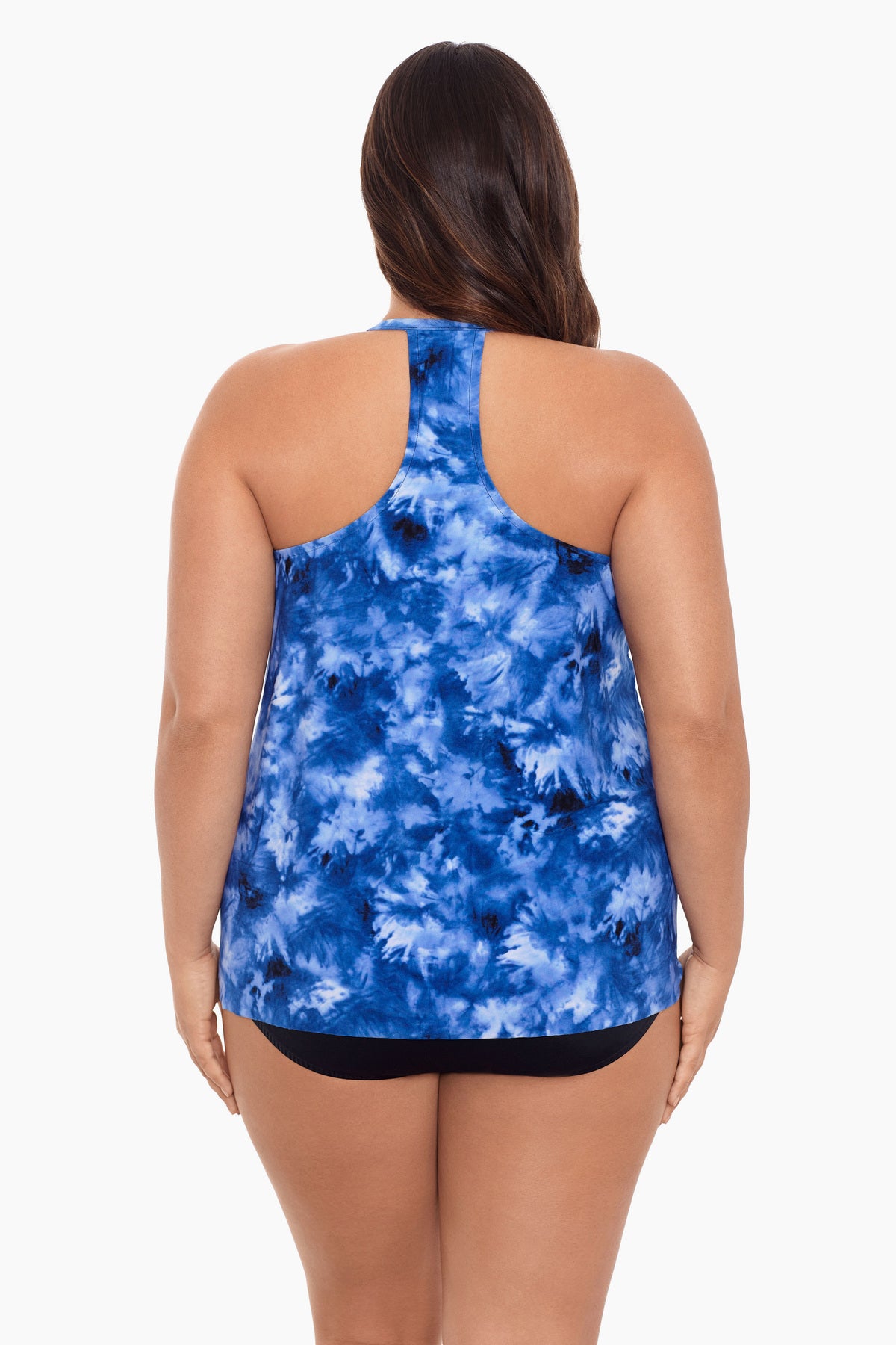 Woman turned away wearing a blue tie dye tankini top