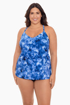 Woman wearing a blue tie dye tankini top