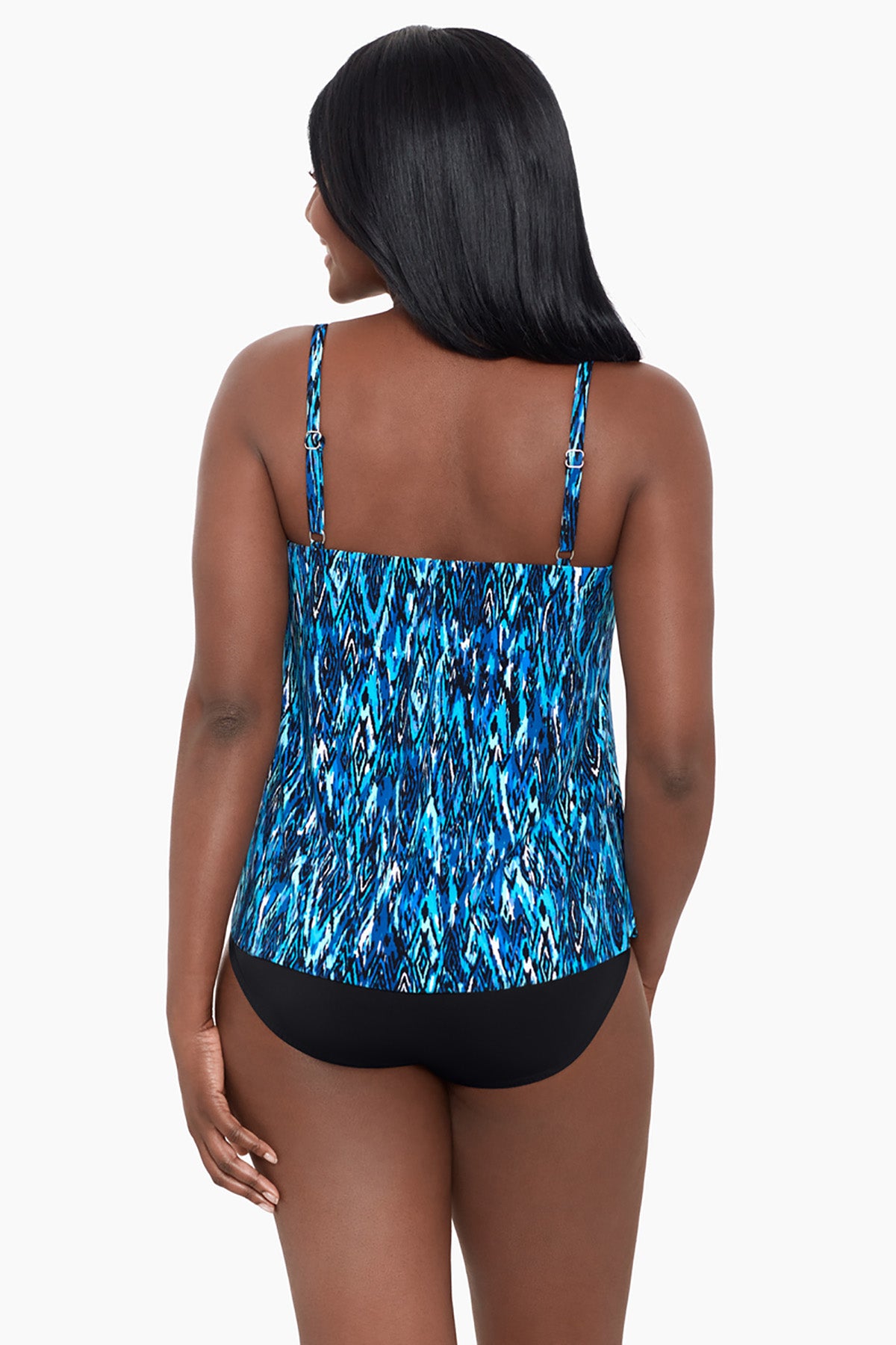 Woman faced away wearing a blue diamond printed tankini top