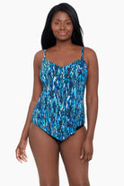 Woman wearing a blue diamond printed tankini top