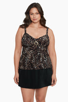 Woman wearing a cheetah print tankini top