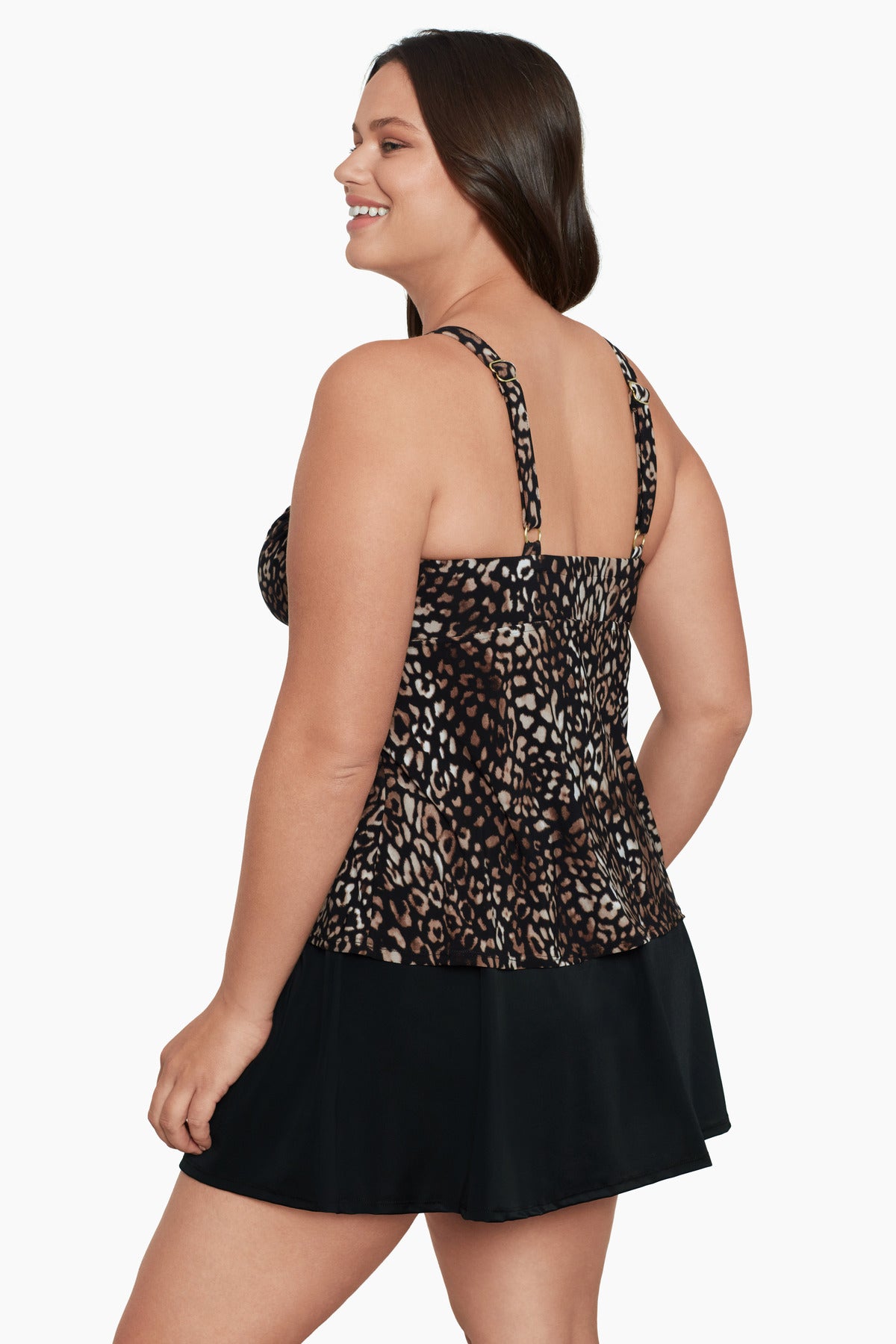 Woman turned left wearing a cheetah print tankini top