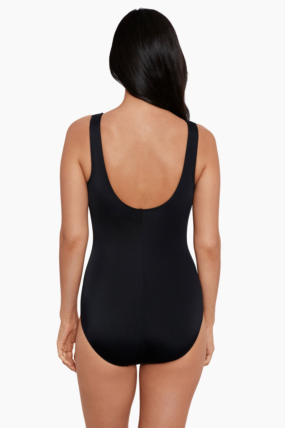 Woman turned away wearing a one-piece swimsuit