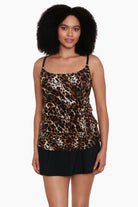 Woman wearing a cheetah print ruffled one-piece faux skirtini swimsuit
