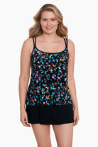 Woman wearing a multicolored tiny floral printed one-piece faux skirtini ruffle swimsuit