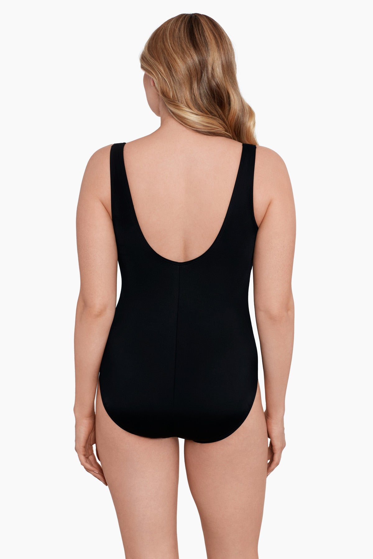 Woman faced away wearing a one-piece swimsuit